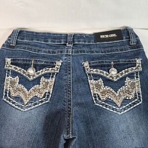 Rich Girl womens- 5 pocket jeans with bling on hip pockets Size 9